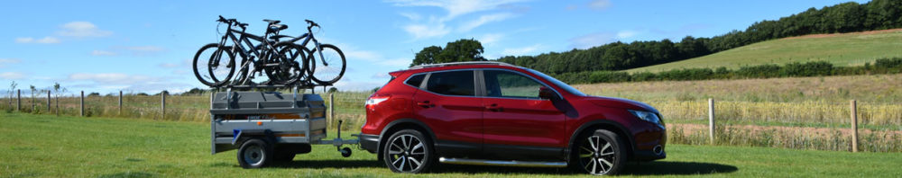 Car towing trailer with bike racks